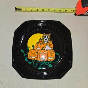 Vintage Halloween plates with cat and pumpkins. Retro Halloween decor. set of 4
